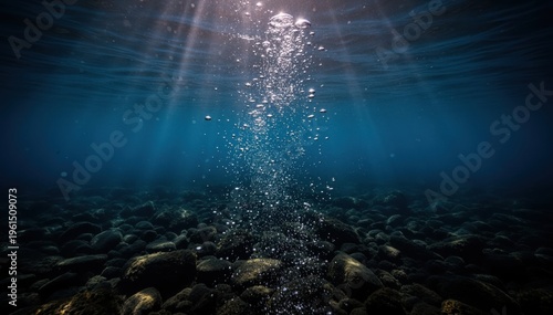 Underwater Ascent: Capture the beauty of an underwater scene as bubbles rise towards the sunlight from the seabed.