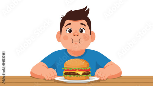 Young boy looking hungry and ready to eat a large delicious cheeseburger on a plate while sitting at a wooden table.