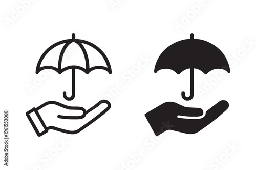 Two umbrella icons held in hands one outlined and one solid black