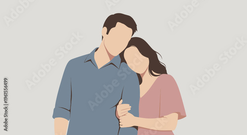 Young couple standing together smiling.