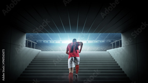 Football player walking through stadium tunnel toward the field. An imaginary stadium is modelled and rendered.