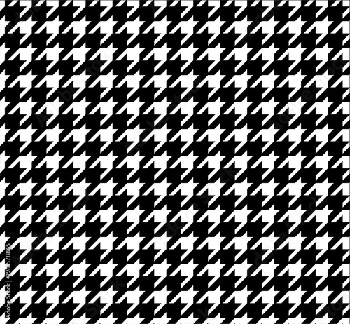 Classic black and white houndstooth seamless pattern background. Traditional fashion textile pattern with repeating geometric design, ideal for fabric prints, fashion design, wallpapers and graphic ba