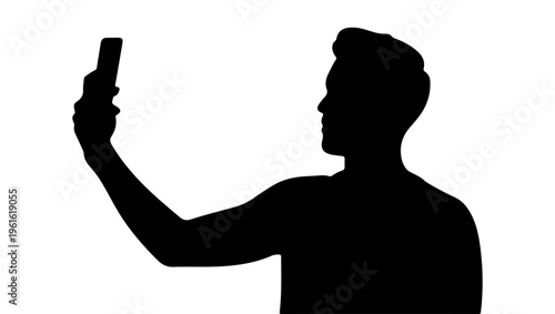 Silhouette of a man taking a selfie with a smartphone device