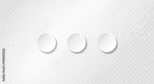 Three white circles with soft shadows on a light background.
