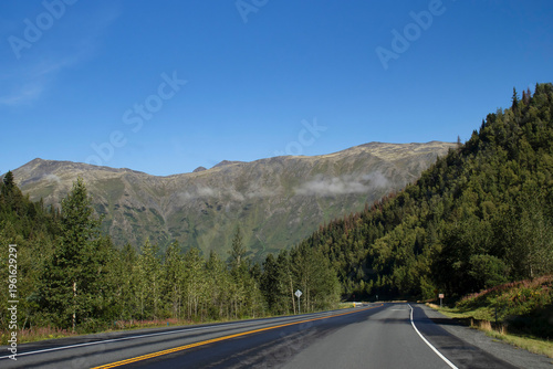 Mountains behind road in Alaska