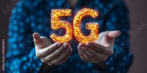 Person holding glowing 5G text, symbolizing advanced technology and connectivity in a modern environment