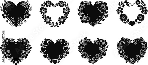 Collection of eight distressed black heart shapes on white background