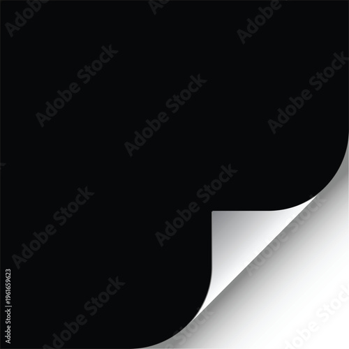 Paper folded corners of light blue and white paper on a black surface