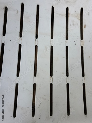 Texture of Slotted Black Plastic Chair Backrest