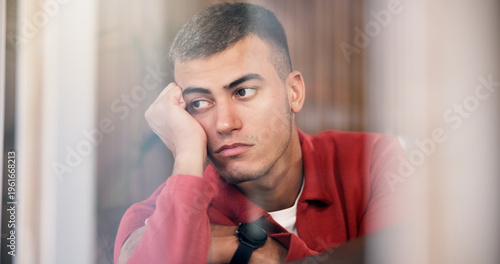 Foto Window, thinking and man with depression, mental health and remember memory for grief in apartment