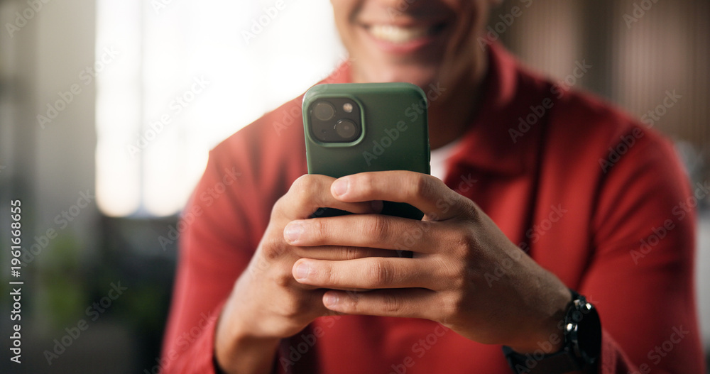Fototapeta premium Man, hands and typing in living room with phone, social media update and text message on dating app. Person, relax and scroll in home with browse website, online chat and entertainment on weekend.