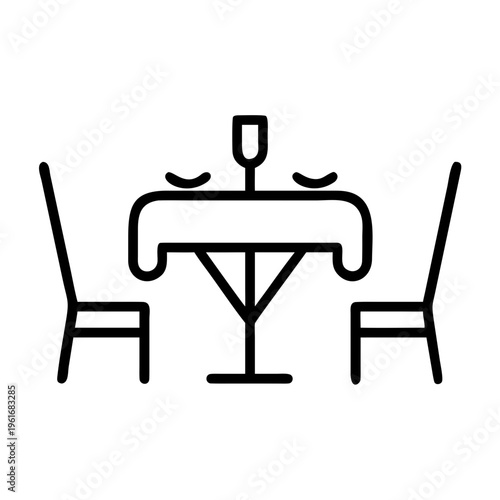 Dining table with chairs place setting and wine glass for romantic dinner or special occasion