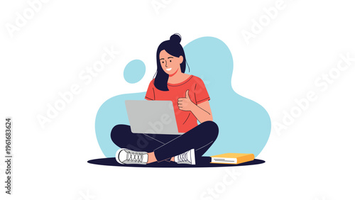 Studious young woman sitting on the floor with a laptop and a book while giving a thumbs up gesture of success and satisfaction.