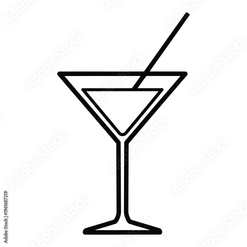 Martini glass with cocktail straw.