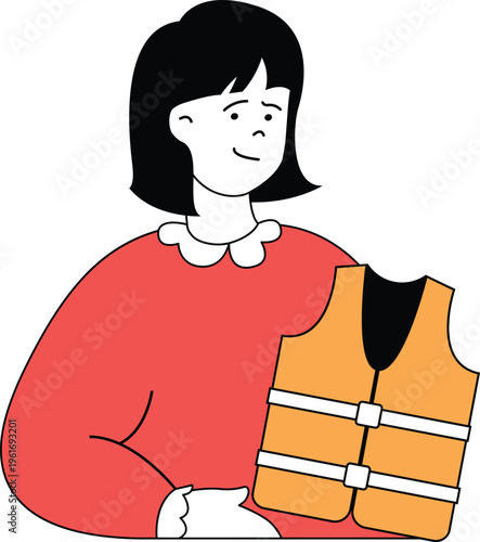 A cheerful young girl holding up a bright yellow and black life vest over her red sweater