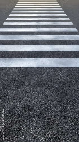 A pedestrian crossing on a dark gray asphalt road with white stripes