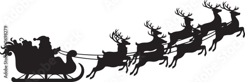 Santa Claus riding in his sleigh pulled by reindeer