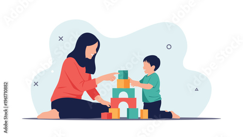 Mother and young son playing together with colorful building blocks on the floor fostering early childhood development and learning.