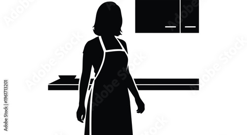 Woman in apron standing in a kitchen a striking silhouette