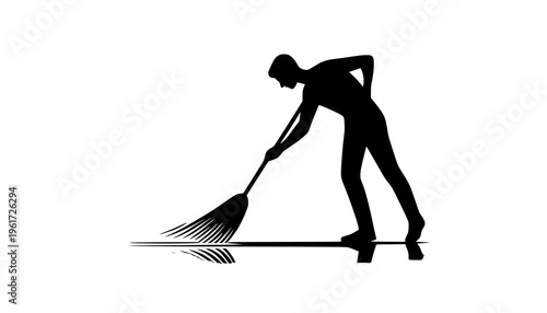 silhouette of a woman with a broom
