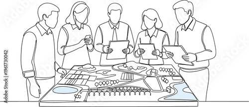 team meeting around table with city plan