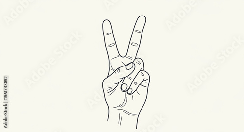 Photos Hand gesture showing peace or victory sign with two fingers up.