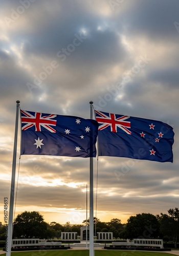 Australian and New Zealand Flags Waving Together at Sunset Memorial Park
