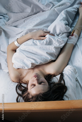 Patient Resting In Hospital Bed