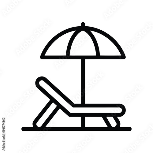 Sun lounger with an open umbrella on a sunny beach