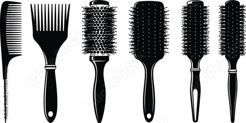 Set of black grooming tools includes various professional combs and circular hair styling brushes isolated on white.