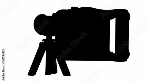 Black silhouette of a professional video camera on a tripod isolated on white background for graphic design