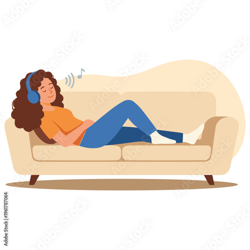 Woman relaxing on a couch listening to music with headphones