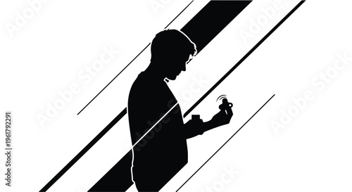 Man in silhouette contemplates a small object, symbolizing thought and precision.