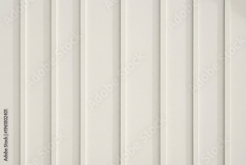 Clean minimalist background of off white vertical board and batten wall siding