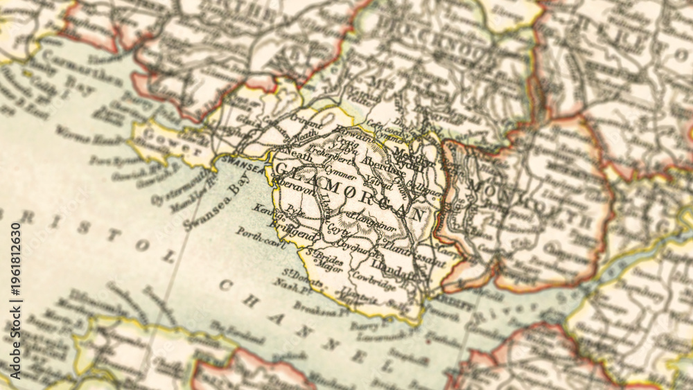 Obraz premium Macro View of Vintage Map Highlighting Glamorganshire Wales with Detailed Regional Cartography