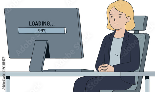Woman sitting at desk waiting for computer to load in office setting