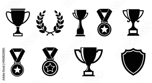 A collection of various awards and medals on display including trophies.