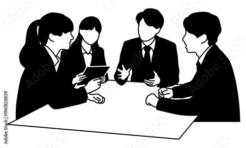 ディスカッションする若い社員たち