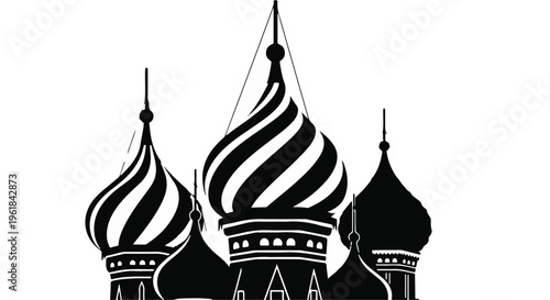 Iconic onion domes of a historic cathedral against a bright sky