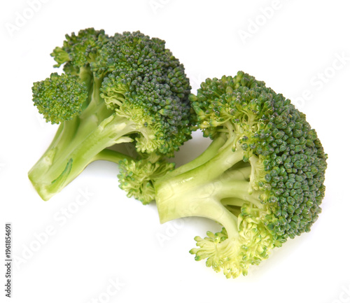 Fresh green small broccoli in group closed up isolated on white