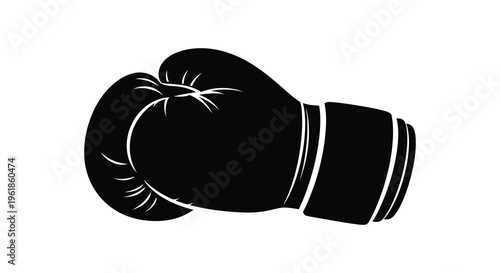 A striking image of boxing gloves in a dark silhouette