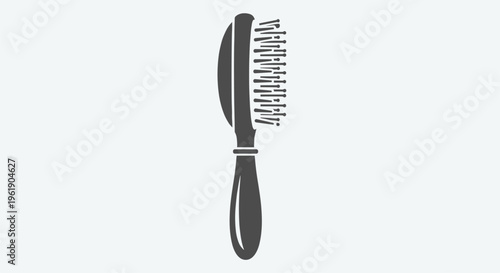 Classic oval hair brush with soft bristles and a comfortable handle, perfect for everyday detangling, smoothing, and adding shine to hair.