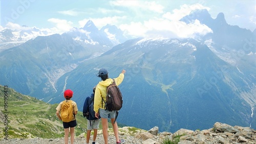 Tableau sur toile Family enjoying mountain view during summer hiking trip