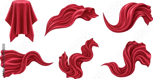 Abstract red fabric swirls and draped cloth isolated on white background for creative design elements with flowing fabric