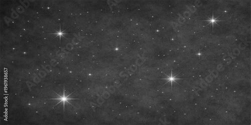 A bright starry night sky over a dark blue galaxy space background featuring an abstract cosmic nebula with sparkling light across the infinite universe