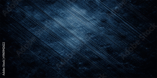 A vintage dark blue grunge background with a textured denim fabric pattern and rough old canvas material surface for a rustic wallpaper backdrop