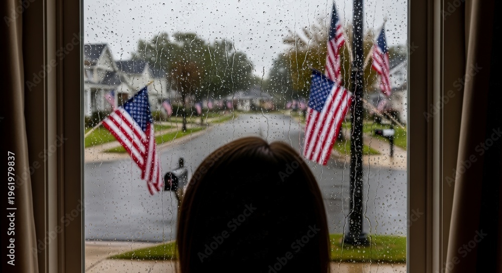 Naklejka premium American flags hanging on street pole.