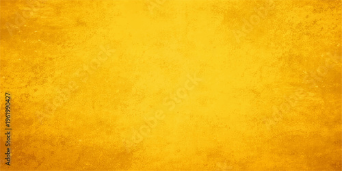 A vintage abstract background of aged yellow and orange wall texture with a grunge stained parchment pattern and a dirty antique paper feel