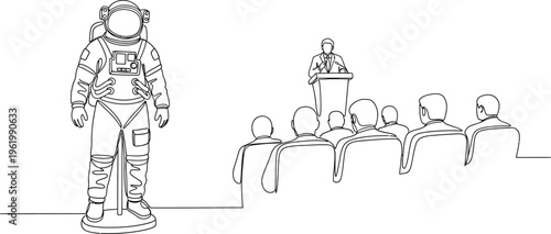 astronaut standing in front of people at conference