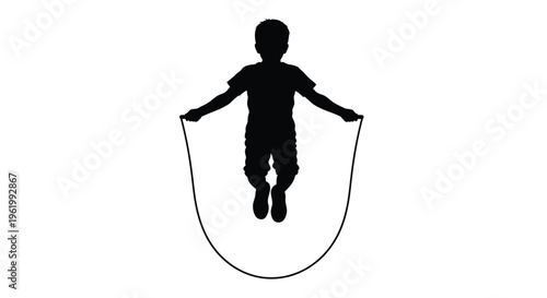 A young boy joyfully jumping rope on a bright day silhouette